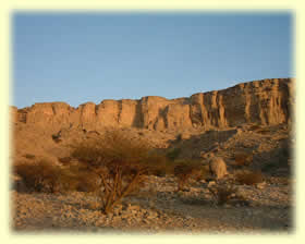 The Jebel Qatar cliffs at sunset The Jebel Qatar cliffs at sunset