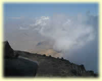 Above the clouds on the approach ridge