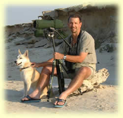 Roy & Chirri go birding - same interest, different motive.